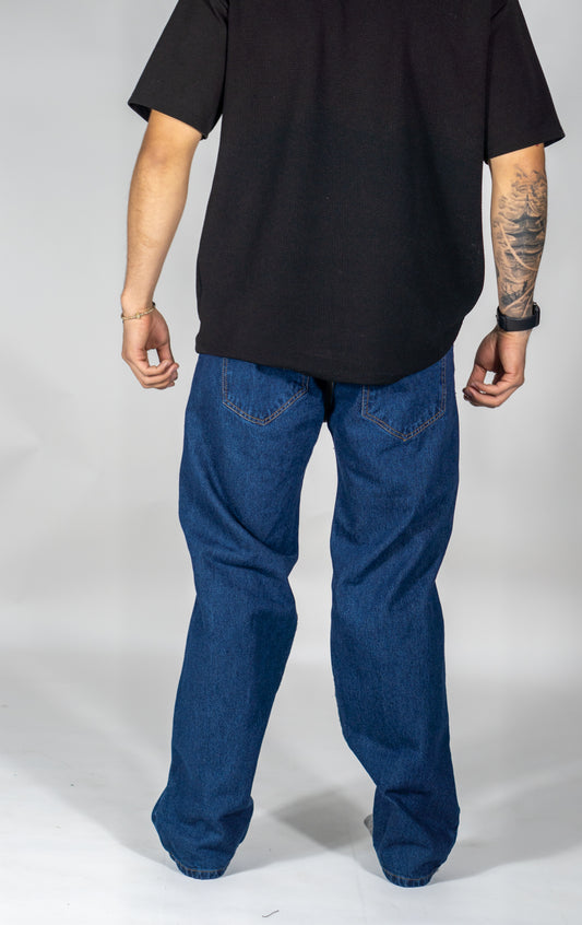 Pantalón en Jean tipo Baggy con rotos en Tono Azul Oscuro
